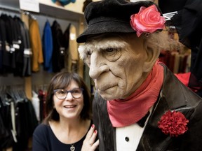 Susan Cohene and store mascot Dobson will put in their last day of work at costume shop Malabar on Halloween Wednesday.