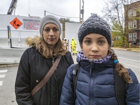 Lisa Wright and her 9-year-old daughter Isabela Lopez-Wright are concerned about air and noise pollution caused by the REM construction site next to École St-Germain.