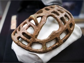 A vintage pretzel-style goalie mask on display at the Hockey Cup History exhibit at the Dorval Museum of Local History and Heritage in Dorval.