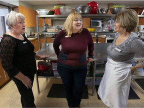 Susan Bednarski (centre) speaks with Louise McAllen (left) and Helen Bain in the kitchen of the Vaudreuil-Soulanges Palliative Care Residence in Hudson.