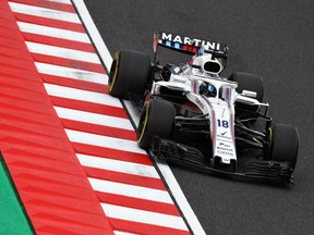 SUZUKA, JAPAN - OCTOBER 06: Lance Stroll of Canada driving the (18) Williams Martini Racing FW41 Mercedes on track during final practice for the Formula One Grand Prix of Japan at Suzuka Circuit on October 6, 2018 in Suzuka.