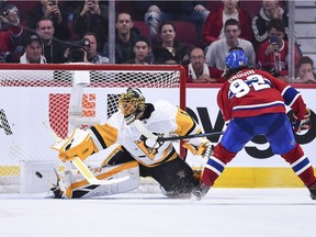 The Canadiens’ Jonathan Drouin scores shootout goal against Pittsburgh Penguins goaltender Casey DeSmith during game at the Bell Centre in Montreal on Oct. 13, 2018.