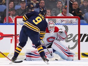 Canadiens goalie Antti Niemi makes save against the Sabres’ Jack Eichel during the third period of NHL game at the KeyBank Centre in Buffalo on Oct. 25, 2018.