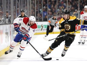 Paul Byron of the Montreal Canadiens skates against Brandon Carlo of the Boston Bruins during the second period at TD Garden on Oct. 27, 2018 in Boston.