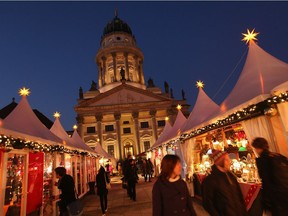 Visitors walk through a Christmas market in Berlin in 2011. St. John’s Lutheran Church will hold a traditional German Christmas market on Dec. 1 and 2, featuring sausages, glühwein and other treats.