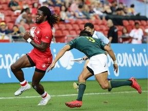 Alouettes' Tevaughn Campbell, left, suited up for the Canadian rugby team against South Africa during the 2018 Singapore Sevens this April.
