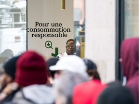 Almost a week after recreational cannabis became legal in Canada, people continue to line up outside the Société québécoise du cannabis store on Ste-Catherine St. W.