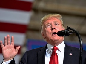 U.S. President Donald Trump speaks during a "Make America Great" rally in Mesa, Arizona on October 19, 2018.