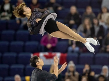 Cheng Peng and Yang Jin of China skate their short program at the 2018 Skate Canada International ISU Grand Prix event in Laval, Quebec, October 26, 2018.