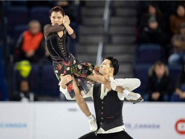 Shiyue Wang and Xinyu Liu of China perform their rhythm dance at the 2018 Skate Canada International ISU Grand Prix event in Laval, Quebec, on October 26, 2018.