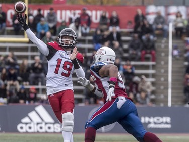 Calgary Stampeders quarterback Bo Levi Mitchell fires the ball down field against the Montreal Alouettes during first-half CFL action at Molson Stadium in Montreal on Monday, Oct. 8, 2018.