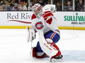 Canadiens goaltender Carey Price makes a glove-save against the Bruins on Saturday, Oct. 27, 2018, in Boston.