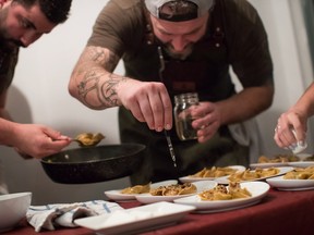 Chef Travis Petersen uses a dropper to add THC distillate to butternut squash tortellini dishes during a multi-course cannabis-infused meal, in Vancouver, on Thursday, Oct. 11, 2018.