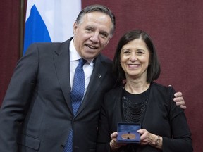 Premier François Legault congratulates Danielle McCann at her swearing-in as MNA for Sanguinet.