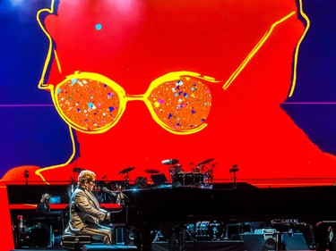 Elton John performs in his Farewell Yellow Brick Road goodbye tour at the Bell Centre in Montreal on Thursday, Oct. 4, 2018.