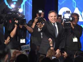 Coalition Avenir du Québec leader and premier-designate François Legault arrives on stage to address supporters as he celebrates after winning the Quebec Provincial election in Quebec City on Monday, October 1, 2018. "Quebecers, who have a knack for being ahead of the curve, have elected a government that’s hard to pinpoint on the ideological spectrum," Lise Ravary writes.