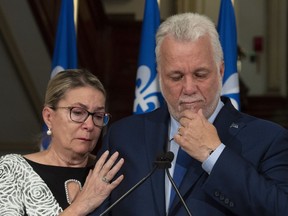 Pausing as he stands next to wife Suzanne Pilote during his final speech as Quebec premier, Liberal leader and MNA, Philippe Couillard advocated protecting rights "They are precious and therefore fragile. Take good care of them."