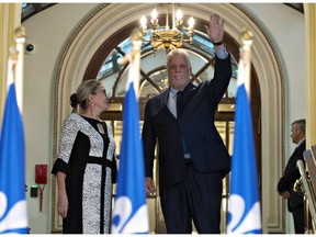 Outgoing Quebec Premier Philippe Couillard announced his resignation in an emotional news conference Thursday alongside his wife, Suzanne Pilote.