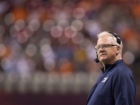 Montreal Alouettes' head coach Mike Sherman watches from the sideline during the second half of a CFL football game against the B.C. Lions in Vancouver on June 16, 2018.