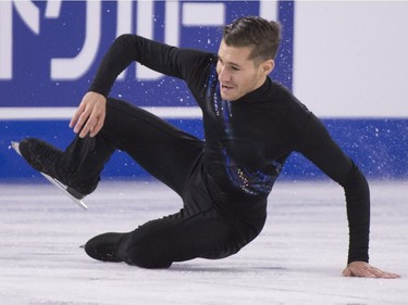 Jason Brown of the United States falls during his short program in the men's competition at Skate Canada International in Laval, Que. on Friday, October 26, 2018.