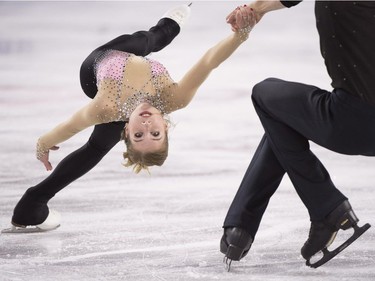 Ekaterina Alexandrovskaya and Harley Windsor of Australia perform their short program in the pairs competition at Skate Canada International in Laval, Que. on Friday, October 26, 2018.
