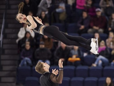 Canada's Evelyn Walsh and Trennt Michaud perform their short program in the pairs competition at Skate Canada International in Laval, Que. on Friday, October 26, 2018.