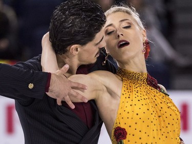 Canada's Piper Gilles and Paul Poirier perform their rhythm dance in the ice dance competition at Skate Canada International in Laval, Que., on Friday, Oct. 26, 2018.