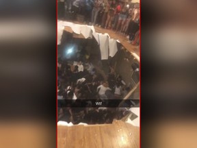 This frame from video shows a floor that collapsed during a party at an apartment near the campus of Clemson University early Sunday, Oct. 21, 2018, in Clemson, S.C.