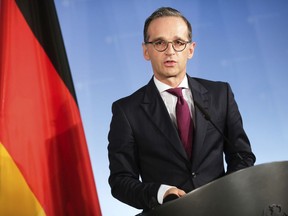 FILE - In this Sept. 14, 2018 file photo German Foreign Minister Heiko Maas attends a joint news conference with Russian Foreign Minister Sergey Lavrov at the Foreign Ministry in Berlin..