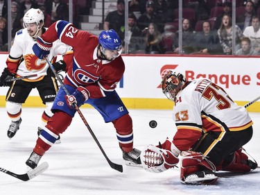 Phillip Danault gets a shot on goaltender David Rittich of the Calgary Flames in the second period at the Bell Centre on Tuesday, Oct.23, 2018.  (Photo by Minas Panagiotakis/Getty Images)