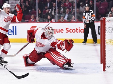 Jimmy Howard of the Detroit Red Wings sees a shot get past him into the net in the second period against the Montreal Canadiens at the Bell Centre on Monday, Oct. 15, 2018.