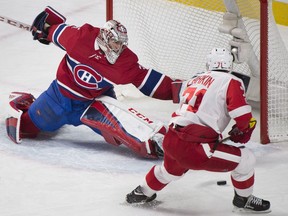 Dylan Larkin moves in on Carey Price during a Detroit-Montreal game at the Bell Centre in December 2017.