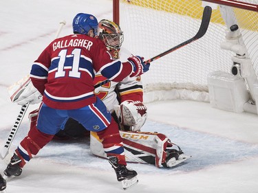 Calgary Flames goaltender David Rittich is scored on by Brendan Gallagher during second- period action in Montreal, Tuesday, Oct. 23, 2018.