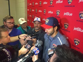 Florida Panthers netminder Roberto Luongo talks to the media Saturday before the pregame ceremony in Sunrise, Fla., honouring him for playing 1,000 games in the NHL. The former Canuck is the third goaltender in NHL history to play in 1,000 games.