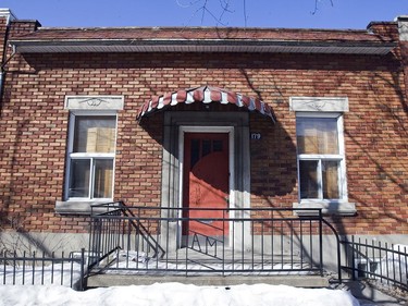 A shoebox bungalow on Mozart St. on March 4, 2009.