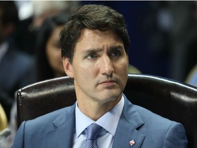 In this file photo taken on October 12, 2018 Canada's Prime Minister Justin Trudeau attends the 17th Francophone countries summit in Yerevan.Trudeau called a byelection Sunday for the riding of Leeds—Grenville—Thousand Islands and Rideau Lakes. But there are currently four vacant seats in Parliament, including Burnaby South, where Singh has said he will run as soon as a byelection is called.