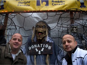 Brad (left) and Brent Smitheman turn Brent's Maywood Ave. front yard in Pointe-Claire into an annual Haunted House fundraiser for the Starlight Children's Foundation.