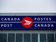 The Canada Post logo is seen on the outside the company's Pacific Processing Centre, in Richmond, B.C., on June 1, 2017.