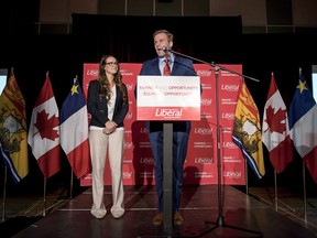 New Brunswick Liberal Leader Brian Gallant delivers a speech to supporters with his wife Karine Lavoie at his election-night headquarters in Grande-Digue, N.B. on Monday, September 24, 2018.