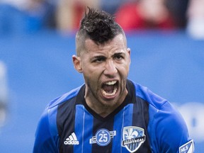 Impact's Saphir Taider celebrates after scoring against Columbus Crew SC during first half MLS soccer action in Montreal on Saturday, Oct. 6, 2018.