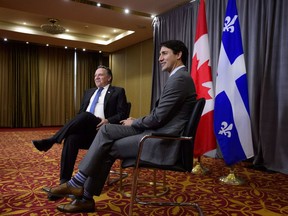 Prime Minister Justin Trudeau meets with then-premier-designate of Quebec François Legault in Yerevan, Armenia on Thursday, Oct. 11, 2018 at the Francophonie Summit.