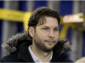 Former Montreal Impact technical director Adam Braz speaks with people on the sidelines during a team practice in Montreal on Jan. 23, 2018.