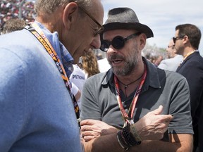 Cirque du Soleil co-founder Guy Laliberté chats on the starting grid at the Canadian Grand Prix Formula 1 in Montreal in June. He was a headlining DJ during the Formula 1 weekend.