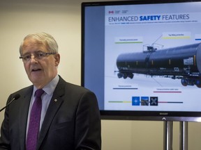 Federal Transport Minister Marc Garneau makes an announcement in Montreal on Monday, July 25, 2016, confirming that older DOT-111 rail tanker cars would not be able to transport crude oil or other dangerous goods as of Nov. 1, 2016. The cars are the same model that was involved in the deadly Lac-Megantic tragedy in which 47 people died in 2013.