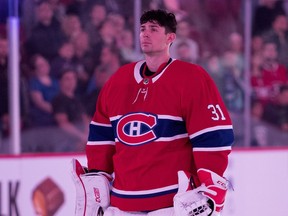 Canadiens goaltender Carey Price stands at the blue line during national anthems before start of NHL preseason game against the Florida Panthers at the Bell Centre in Montreal on Sept. 19, 2018.