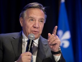 François Legault addresses CAQ candidates, elected and defeated, in a meeting in Montreal on Oct. 3, 2018.