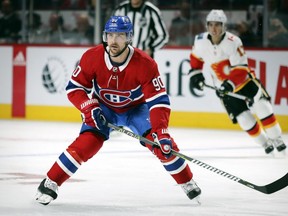 Montreal Canadiens' Tomas Tatar forechecks against the Calgary Flames in Montreal on Oct. 23, 2018.