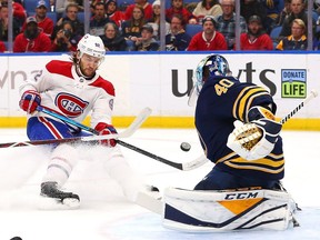 Carter Hutton of the Buffalo Sabres makes a save against Jonathan Drouin of the Montreal Canadiens during the first period on Oct. 25, 2018, in Buffalo.