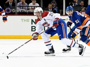 Jeff Petry of the Montreal Canadiens skates with the puck against Valtteri Filpulla of the New York Islanders in the third period on Nov. 5, 2018, in Brooklyn, N.Y.