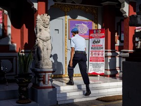 BALI, INDONESIA - NOVEMBER 21:  A prison officer enters Bangli Prison before the release of Bali Nine Member Renae Lawrence on November 21, 2018 in Bangli, Bali, Indonesia. Renae Lawrence, a member of the infamous Bali Nine, will be released from Bangli prison in Indonesia after spending 13 years behind bars following an attempt to smuggle more than two kilograms of heroin into Bali.